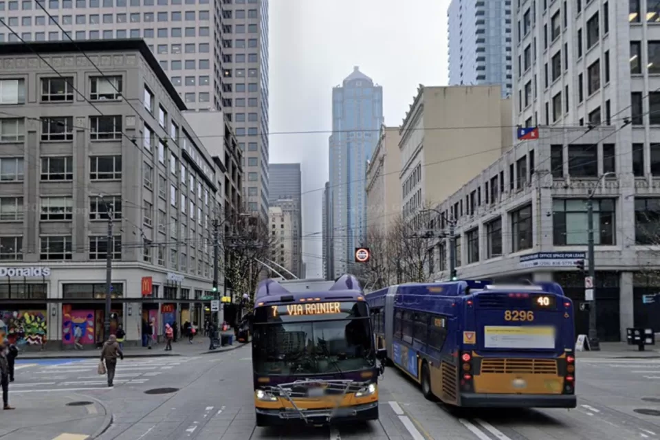 Google Street View of Third Avenue in Seattle with buses and pedestrians